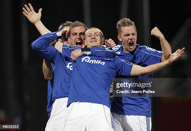 Tim Wulff of Kiel celebrates with his team mates after scoring his team's second goal during the 3. Liga match between Holstein Kiel v SpVgg...