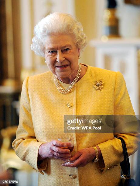 Queen Elizabeth II hosts a reception for Civil Service Commissioners at Buckingham Palace on March 24, 2010 in London, England.