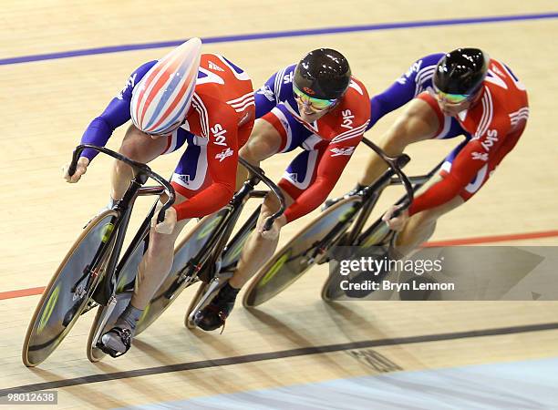 The Great Britain Team of Jason Kenny, Ross Edgar and Sir Chris Hoy in action during Qualifying for Men's Team Sprint on Day One of the UCI Track...