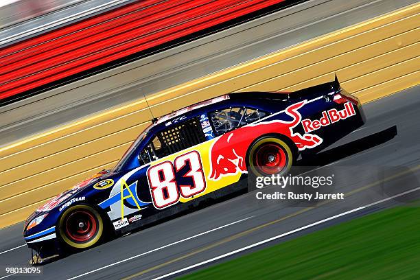 Brian Vickers drives the Red Bull Toyota during NASCAR Sprint Cup Series testing at Charlotte Motor Speedway on March 24, 2010 in Concord, North...