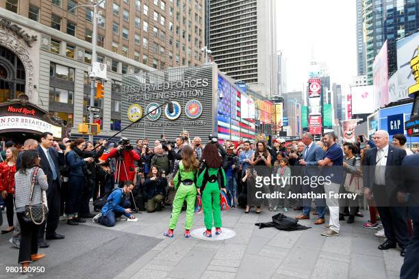 Danica Patrick poses with a lego replica of herself in Times Square in New York City on a media tour for the Indianapolis 500 on May 22, 2018 in New...