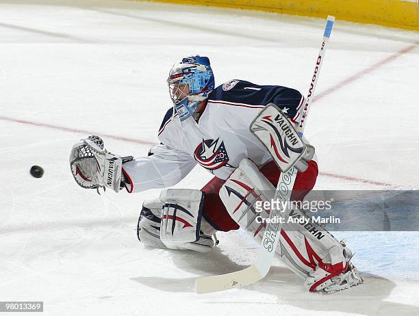 Steve Mason of the Columbus Blue Jackets makes a glove save against the New Jersey Devils during the game at the Prudential Center on March 23, 2010...