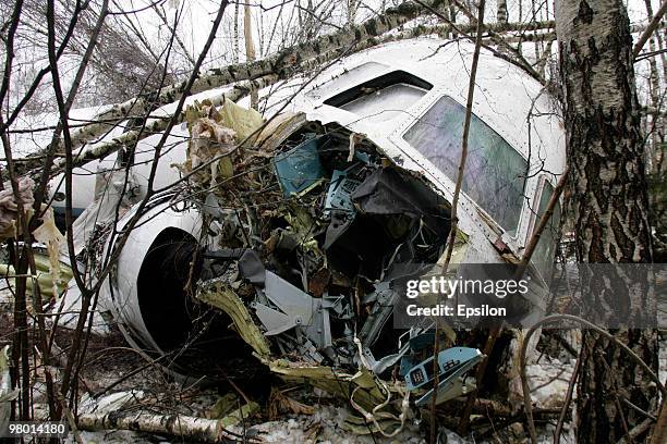 Air crash investigators and emergency personnel at the scene of a crashed Russian Tupolev TU-204 plane near Domodedovo airport on March 22, 2010 near...