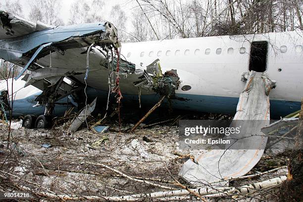 Air crash investigators and emergency personnel at the scene of a crashed Russian Tupolev TU-204 plane near Domodedovo airport on March 22, 2010 near...