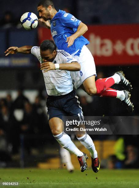 Hayden Mullins of Portsmouth challenges Didier Drogba of Chelsea during the Barclays Premier League match between Portsmouth and Chelsea at Fratton...