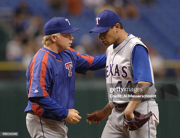 Texas Rangers manager Buck Showalter removes pitcher Vincente Padilla against the Tampa Bay Devil Rays at Tropicana Field in St. Petersburg, Florida...