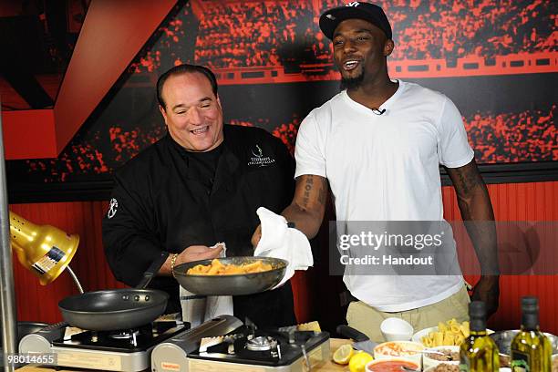 In this handout image provided by Disney, Pittsburgh Steelers wide receiver and Super Bowl XLIII MVP Santonio Holmes shows off his culinary skills...