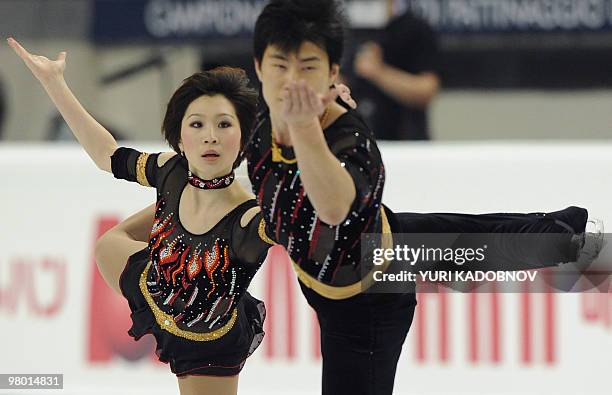 China's Dan Zhang and Hao Zhang perform during the Pairs free skating competition of the World Figure Skating Championships on March 24, 2010 at the...