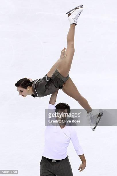 Jessica Dube and Bryce Davison of Canada compete in the Pairs Free Skate during the 2010 ISU World Figure Skating Championships on March 24, 2010 at...