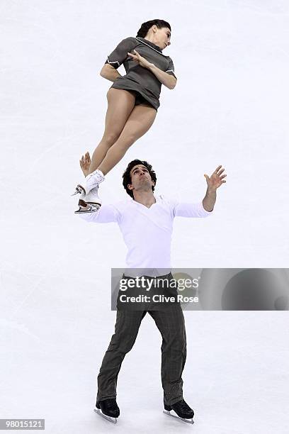 Jessica Dube and Bryce Davison of Canada compete in the Pairs Free Skate during the 2010 ISU World Figure Skating Championships on March 24, 2010 at...