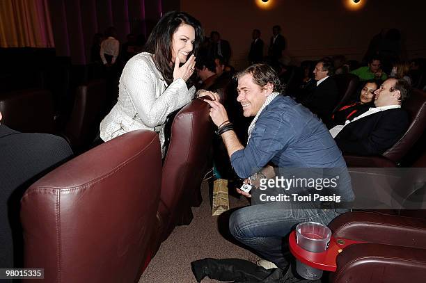 Actress Christine Neubauer and actor Sven Martinek attend the premiere of 'Haltet Die Welt An' at Astor Film Lounge on March 24, 2010 in Berlin,...