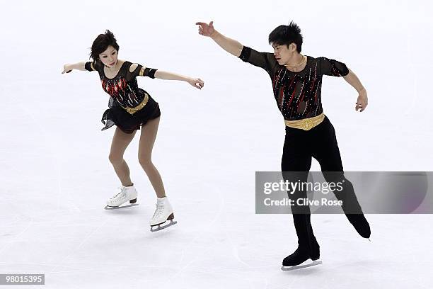 Dan Zhang and Hao Zhang of China compete in the Pairs Free Skate during the 2010 ISU World Figure Skating Championships on March 24, 2010 at the...