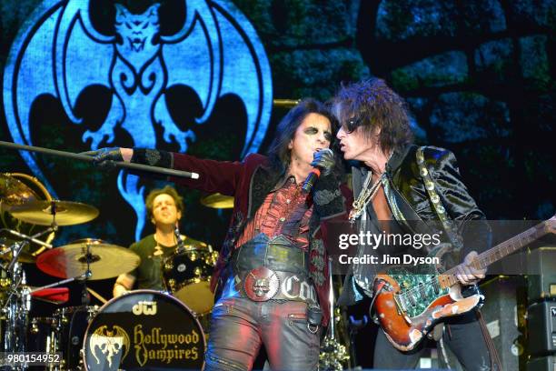 Alice Cooper and Joe Perry of Hollywood Vampires perform live on stage at Wembley Arena on June 20, 2018 in London, England.