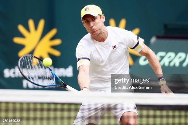 Matthew Ebden of Australia plays a forehand volley to Philipp Kohlschreiber of Germany during their round of 16 match on day 4 of the Gerry Weber...