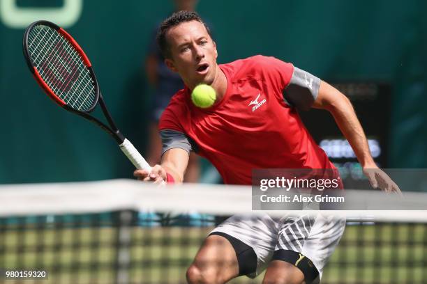 Philipp Kohlschreiber of Germany plays a forehand volley to Matthew Ebden of Australia during their round of 16 match on day 4 of the Gerry Weber...