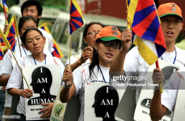 Tibetan students rally for an appeal to the United Nations against the forceful intermarriage of Tibetan and Chinese and the control over birth of...