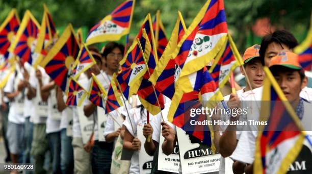 Tibetan students rally for an appeal to the United Nations against the forceful intermarriage of Tibetan and Chinese and the control over birth of...