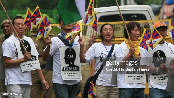 Tibetan students rally for an appeal to the United Nations against the forceful intermarriage of Tibetan and Chinese and the control over birth of...