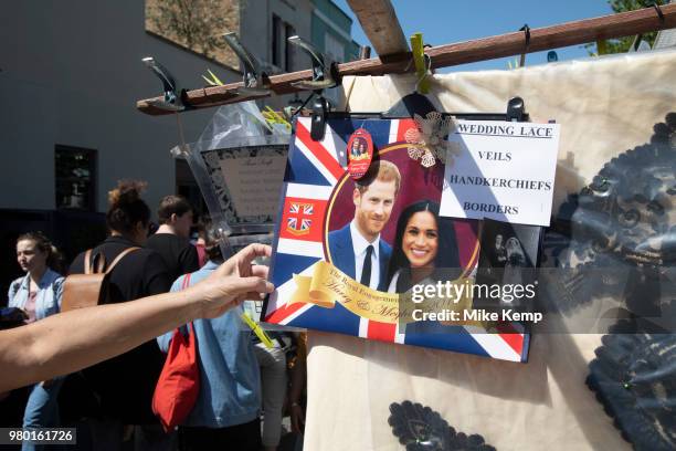 Souvenir bags for sale of Harry and Meghan in London, England, United Kingdom. These royal gifts selling on a stall were prior to the royal wedding...