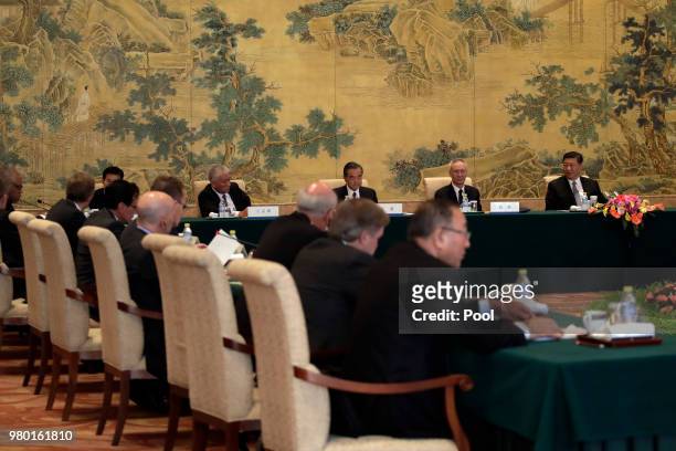 Chinese President Xi Jinping with members of Global chief executive committee during the round table summit at the Diaoyutai State Guesthouse on June...