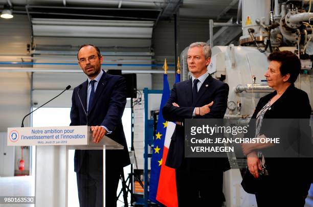 French Prime Minister Edouard Philippe delivers a speech nest to French Economy Minister Bruno Le Maire and French Minister of Higher Education,...