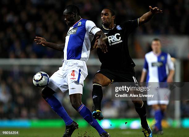 Cameron Jerome of Birmingham City battles for the ball with Chris Samba of Blackburn Rovers during the Barclays Premier League match between...