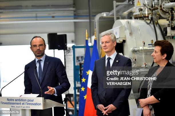 French Prime Minister Edouard Philippe delivers a speech nest to French Economy Minister Bruno Le Maire and French Minister of Higher Education,...