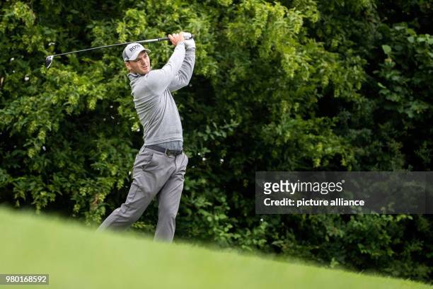 June 2018, Germany, Pulheim: Golf, European Tour - International Open. German golfer Martin Kaymer hitting a shot. Photo: Marcel Kusch/dpa