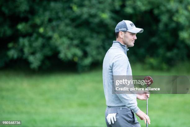 June 2018, Germany, Pulheim: Golf, European Tour - International Open. German golfer Martin Kaymer walking over the green. Photo: Marcel Kusch/dpa