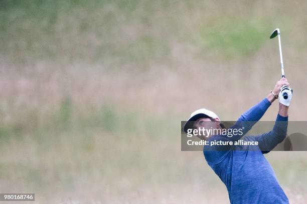 June 2018, Germany, Pulheim: Golf, European Tour - International Open. Danish golfer Thorbjørn Olesen hitting a shot. Photo: Marcel Kusch/dpa