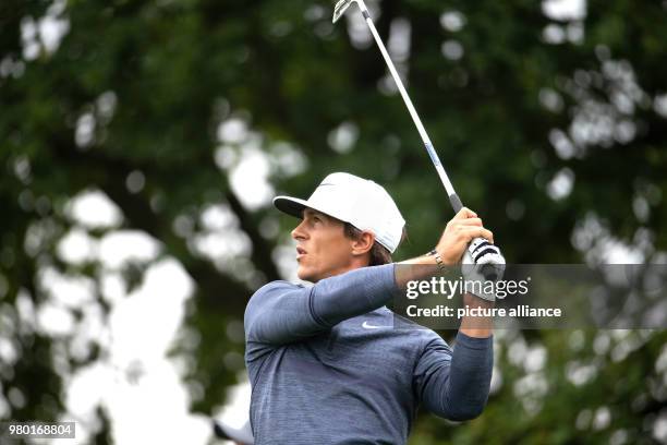 June 2018, Germany, Pulheim: Golf, European Tour - International Open. Danish golfer Thorbjørn Olesen hitting a shot. Photo: Marcel Kusch/dpa