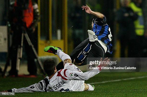 Daniele Dessena of Cagliari Calcio strikes Zapata Jaime Valdes of Atalanta BC during the Serie A match between Atalanta BC and Cagliari Calcio at...