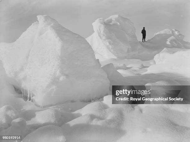 Man standing on ice field, Antarctica, 1914. Imperial Trans-Antarctic Expedition 1914-1916 .