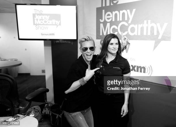 Danica Patrick poses with Jenny McCarthy on set of her radio show in New York City on a media tour for the Indianapolis 500 on May 22, 2018 in New...