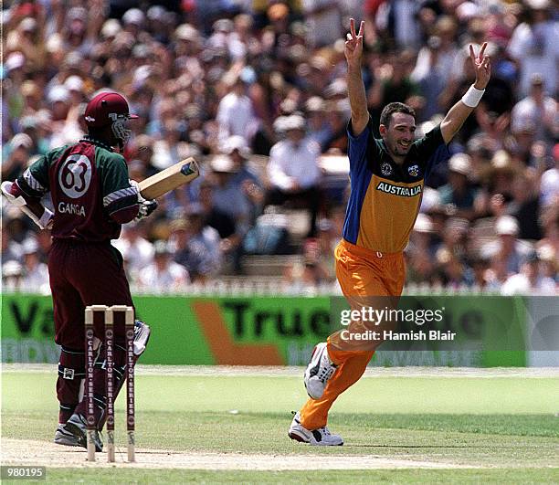 Damien Fleming of Australia celebrates the wicket of Daren Ganga of West Indies caught by Shane Warne for nought during the Carlton Series One Day...