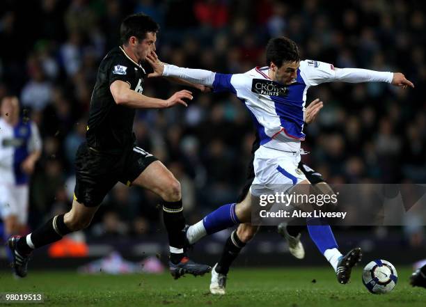 Nikola Kalinic of Blackburn Rovers holds off Keith Fahey of Birmingham City during the Barclays Premier League match between Blackburn Rovers and...