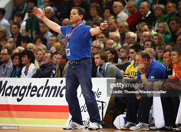 Head coach of Kiel Alfred Gislason gestures during the Handball Bundesliga match between Frisch Auf Goeppingen and THW Kiel at the EWS Arena on March...