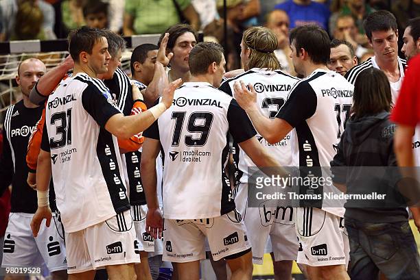 Players of Kiel celebrating after the Handball Bundesliga match between Frisch Auf Goeppingen and THW Kiel at the EWS Arena on March 24, 2010 in...