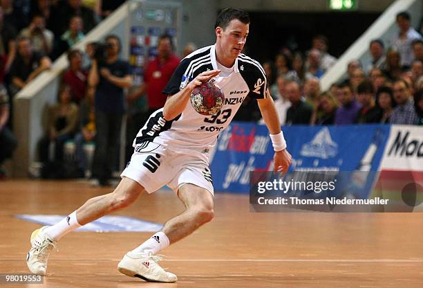 Dominik Klein of Kiel runs with the ball during the Handball Bundesliga match between Frisch Auf Goeppingen and THW Kiel at the EWS Arena on March...