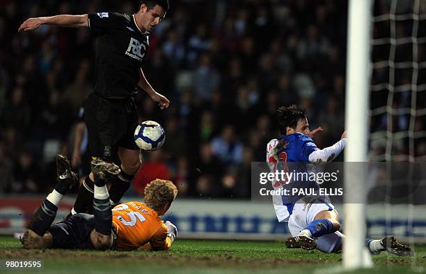 Blackburn Rovers' Croatian forward Nikola Kalinic misses a scoring chance as Birmingham City's English goalkeeper Joe Hart spills the ball during...