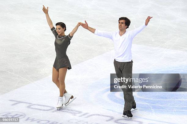 Jessica Dube and Bryce Davison of Canada compete in the Pairs Free Skating during the 2010 ISU World Figure Skating Championships on March 24, 2010...