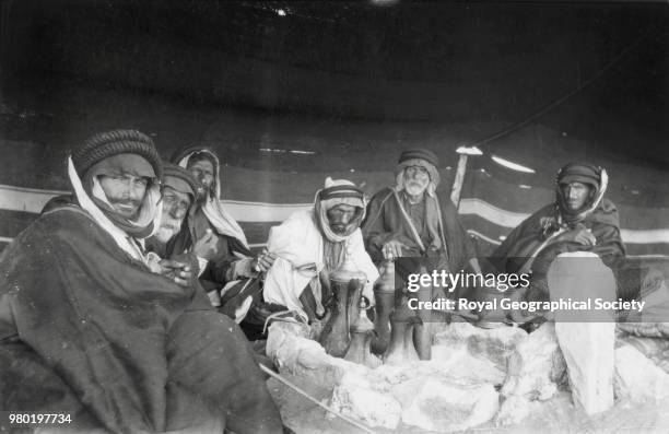 Group of Arabs inside their tent, Saudi Arabia, 1934.