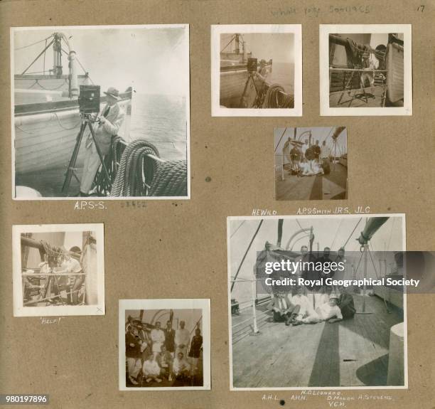 Members of the crew using a camera, From an album collated by Aubrey Ninnis, member of the 'Ross Sea Party' crew. These photographs show members of...