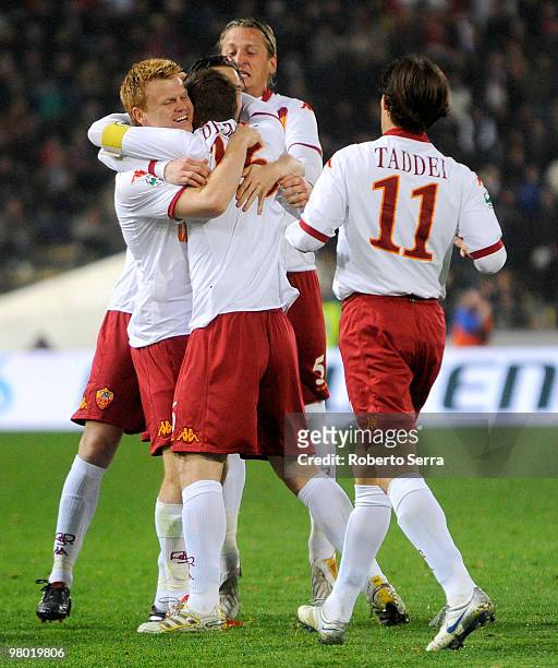 John Arne Riise of Roma celebrates with team mates after scoring during the Serie A match between Bologna FC and AS Roma at Stadio Renato Dall'Ara on...