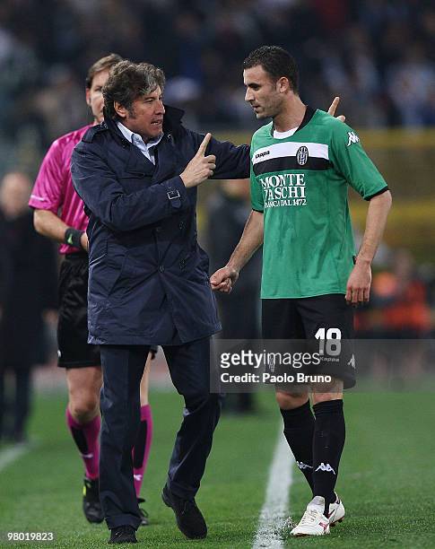 Alberto Malesani the coach of AC Siena speaks with his player Abdel Kader Ghezzal during the Serie A match between SS Lazio and AC Siena at Stadio...