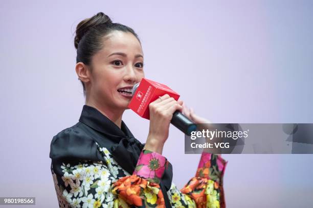 Japanese actress Erika Sawajiri attends a meeting of film 'The Cat In Their Arms' during the 21st Shanghai International Film Festival at Shanghai...