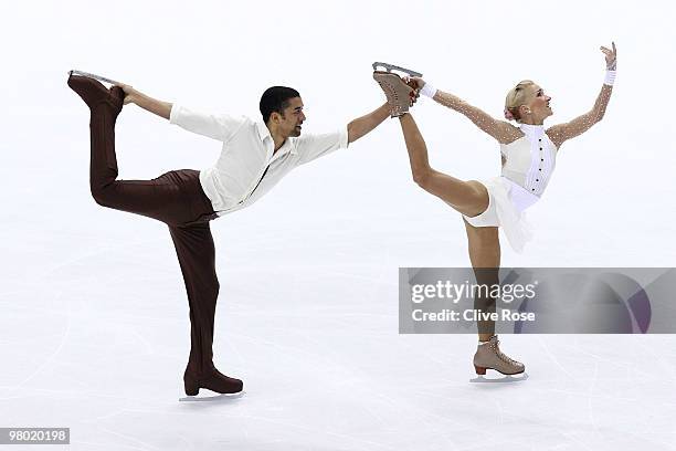 Aliona Savchenko and Robin Szolkowy of Germany compete during the Pairs Free Skate during the 2010 ISU World Figure Skating Championships on March...