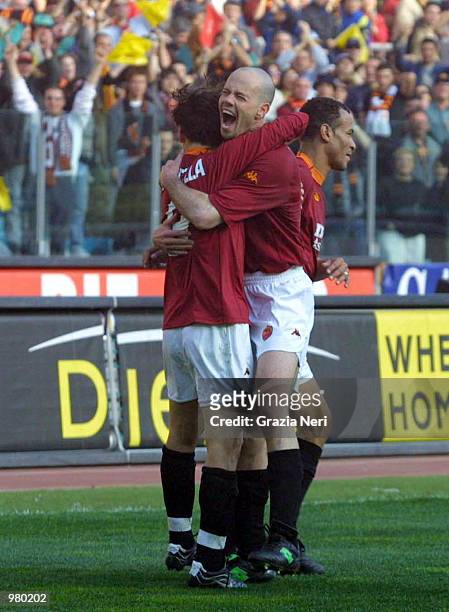 Vincenzo Montella of Roma celebrates after scoring with team mate Zago during a Serie A 22th Round League match between Roma and Brescia, played at...
