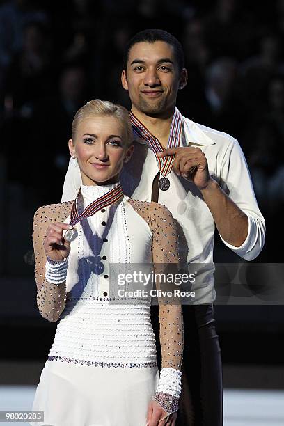 Aliona Savchenko and Robin Szolkowy of Germany pose with their silver medal after the Pairs Free Skate during the 2010 ISU World Figure Skating...