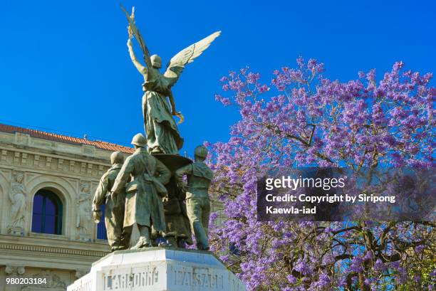 rear view of the monument aux morts in cannes, france. - copyright by siripong kaewla iad stock pictures, royalty-free photos & images